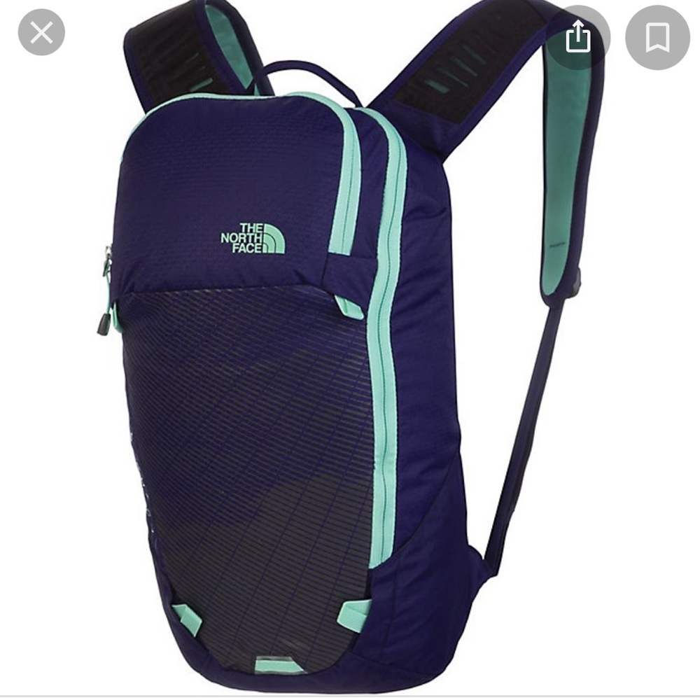 North Face hiking bag. Pachacho. Purple. Minor tear on mesh material.